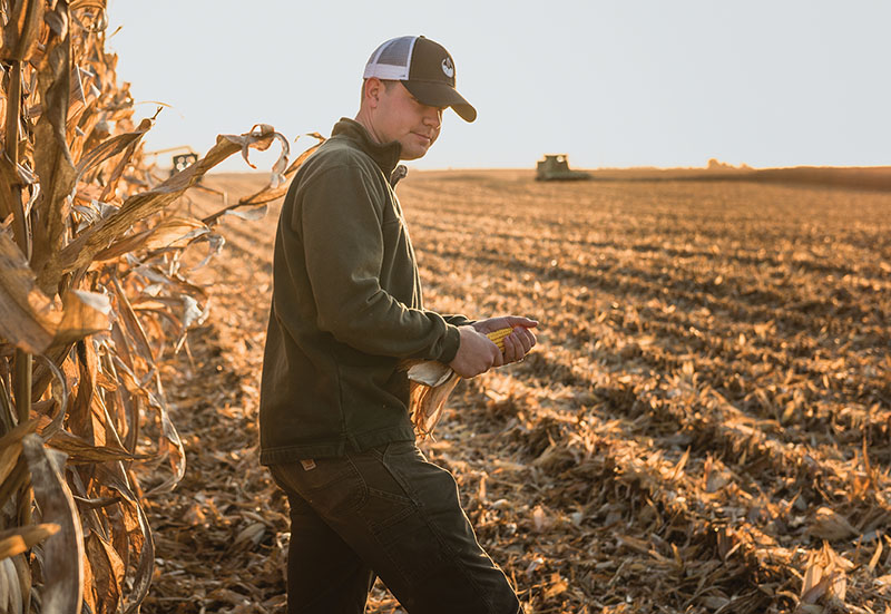 photo of corn farmer in field
